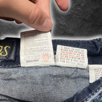 streetcave.eu Buckaroo Jeans Pflegeetikett mit Waschanleitung und Markenlogo in einer Distressed Denim Hose