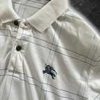 streetcave.eu Burberry Black Label Poloshirt in Weiß mit feinem Karomuster und gesticktem Reiter-Logo auf der Brust